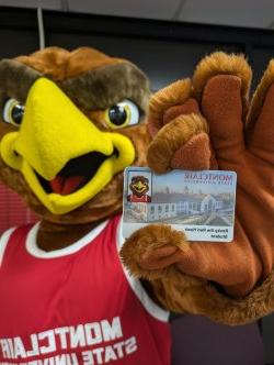 Rocky holding up his new ID Card.